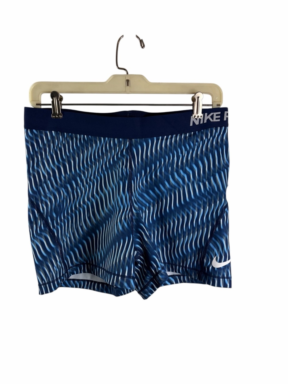 Nike Pro compression shorts featuring a dynamic wavy graphic design